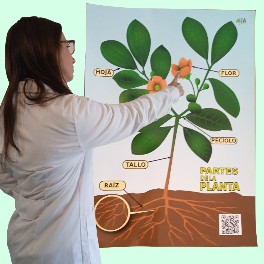 maestra con afiche de ciencias naturales